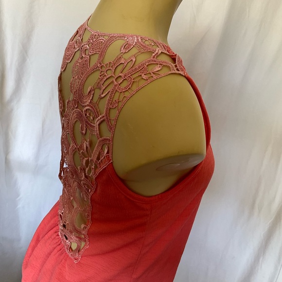Filly Flair sleeve top. It has a very delicate detailed back in a coral color. - Picture 5 of 8